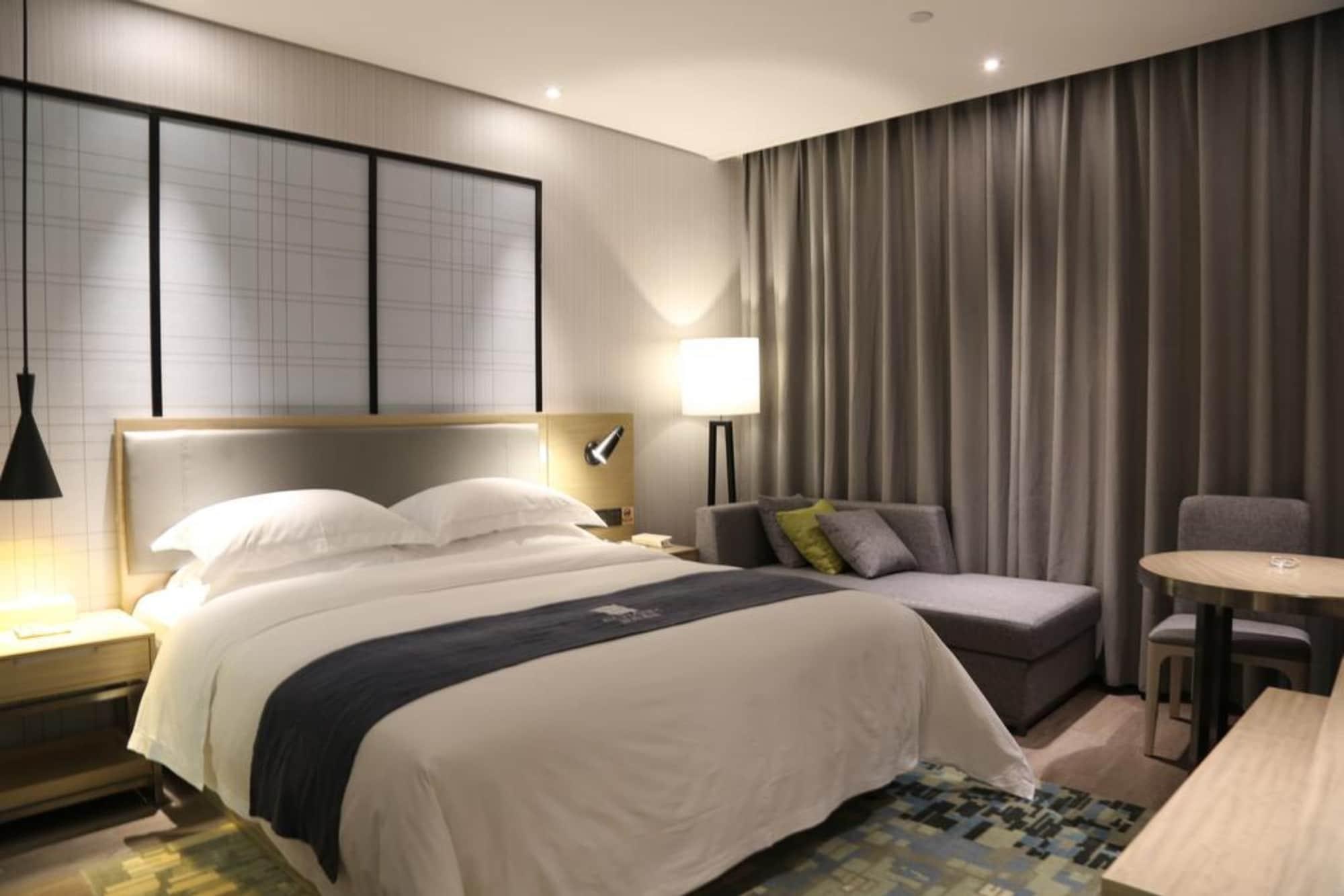 Echarm Hotel Guangzhou Kecun Metro Station Exteriör bild